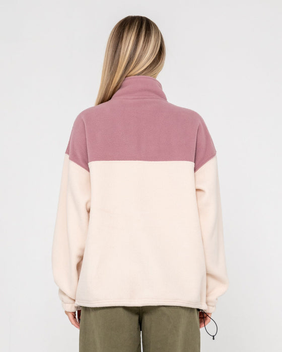 woman-wearing-central-division-crew-polar-fleece-in-pink-a-boo