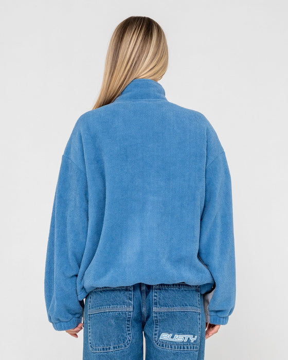 woman-wearing-two-tides-zip-through-sherpa-fleece-in-blue-grey