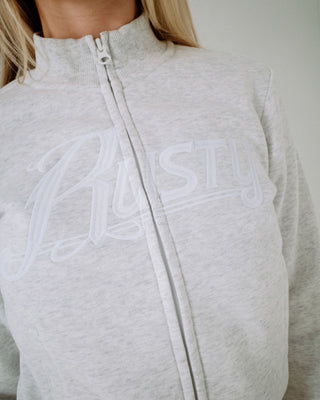 Woman wearing Trailer Trash Skimmer Zip Through Fleece in Ecru Marle