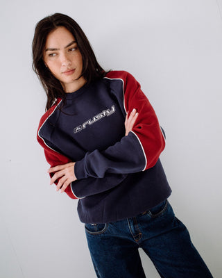 Woman wearing South Of The River Oversize Crew Fleece in Navy / Red