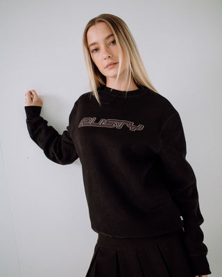 Woman wearing R Essential Oversized Crew Fleece in Black