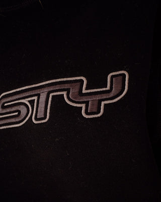 Woman wearing R Essential Oversized Crew Fleece in Black