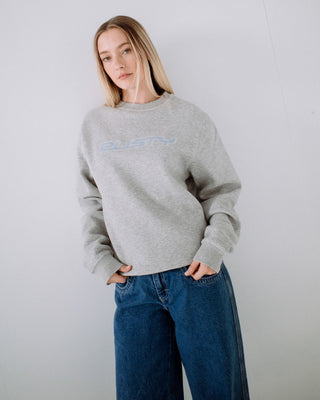 Woman wearing R Essential Oversized Crew Fleece in Grey Marle