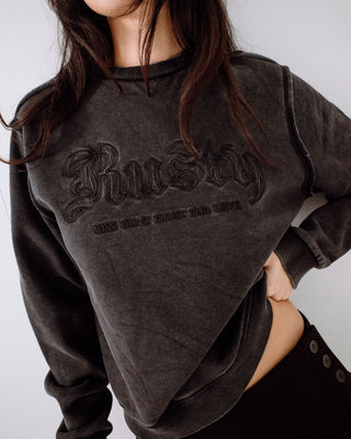 Woman wearing Roxanne Oversized Crew Neck Fleece in Washed Black