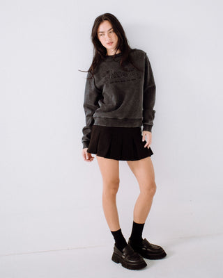 Woman wearing Roxanne Oversized Crew Neck Fleece in Washed Black