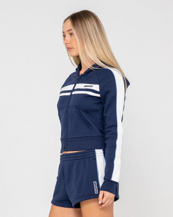 woman-wearing-retro-lines-zip-through-hooded-fleece-in-navy-blue