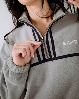 Woman wearing Bind Me Up Contrast Polar Fleece in Grey / Navy