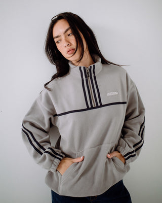 Woman wearing Bind Me Up Contrast Polar Fleece in Grey / Navy