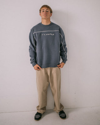 Man wearing Trigger Crew Fleece in Atlantic Blue