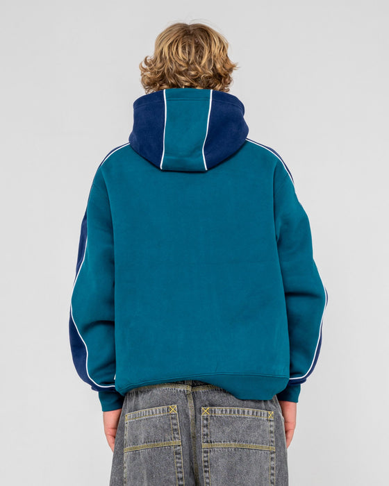 man-wearing-panela-anderson-2-0-hooded-fleece-in-deep-teal