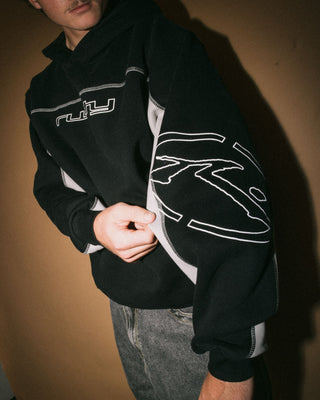 Man wearing Titan Hooded Fleece in Black