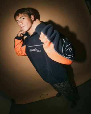 Man wearing Titan Hooded Fleece in Navy Blue