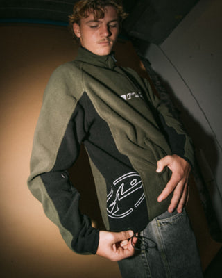 Man wearing Blizzard Quarter Zip Polar Fleece in Army Green