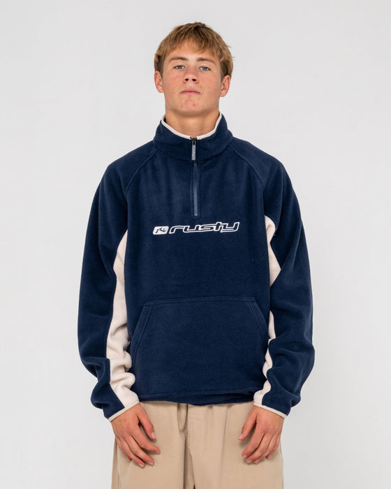 man-wearing-blizzard-quarter-zip-polar-fleece-in-navy-blue