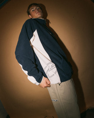 Man wearing Blizzard Quarter Zip Polar Fleece in Navy Blue