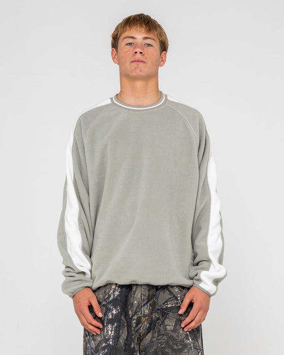 man-wearing-triggerman-crew-neck-polar-fleece-in-stone-grey