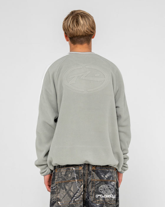man-wearing-triggerman-crew-neck-polar-fleece-in-stone-grey