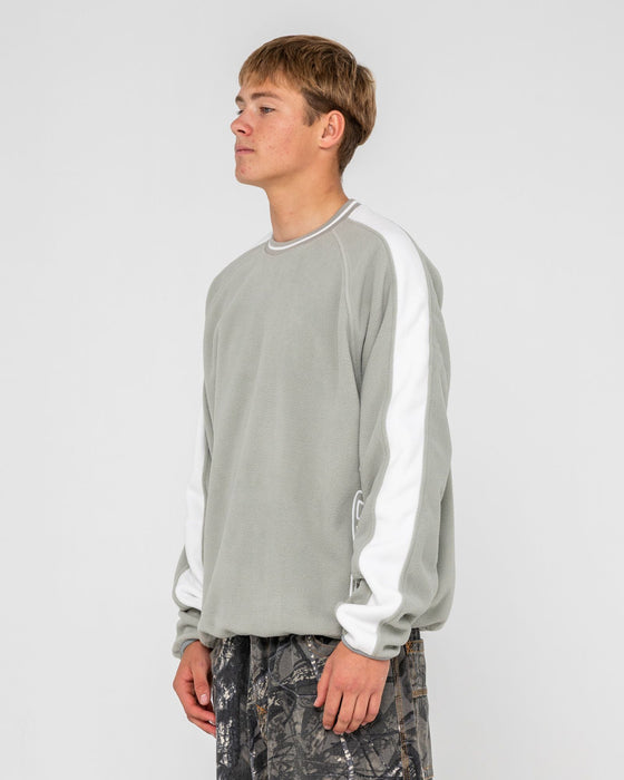 man-wearing-triggerman-crew-neck-polar-fleece-in-stone-grey