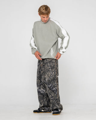 Man wearing Triggerman Crew Neck Polar Fleece in Stone Grey