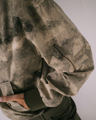 Woman wearing Fly Away Bomber Jacket in Camo