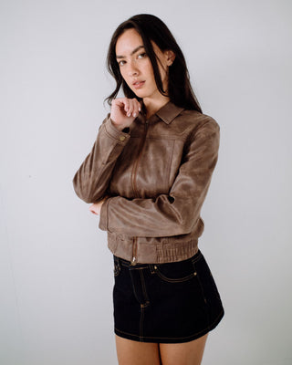Woman wearing Lizzy Faux Leather Fitted Jacket in Ash Brown