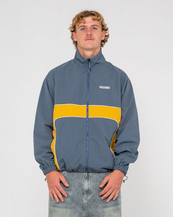 man-wearing-hocus-pocus-zip-thru-jacket-in-steel-blue