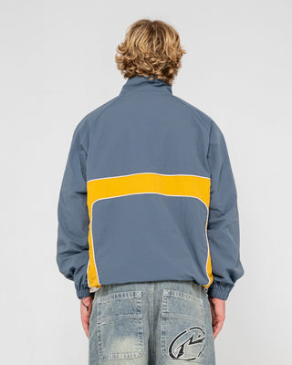 Man wearing Hocus Pocus Zip Thru Jacket in Steel Blue