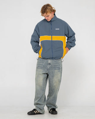 Man wearing Hocus Pocus Zip Thru Jacket in Steel Blue