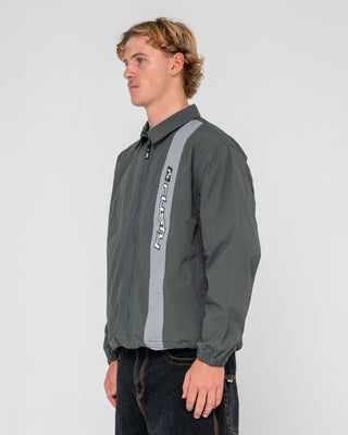 Man wearing Pirahna Shell Jacket in Slate