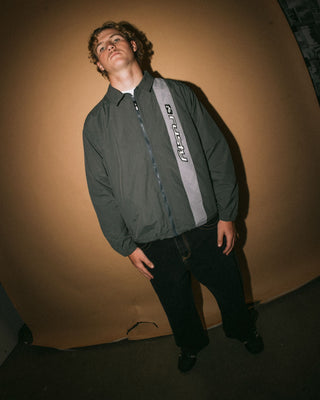 Man wearing Pirahna Shell Jacket in Slate