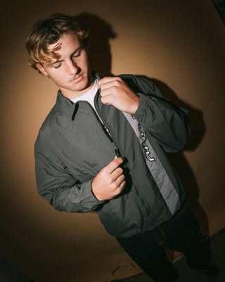 Man wearing Pirahna Shell Jacket in Slate