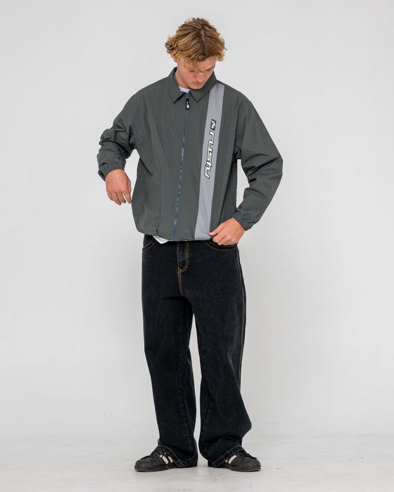 man-wearing-pirahna-shell-jacket-in-slate