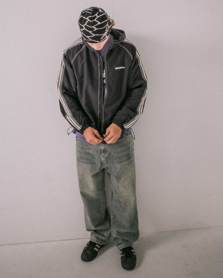 Man wearing Lock Out Hooded Jacket in Black