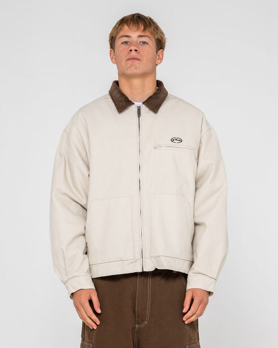 man-wearing-wookie-workwear-jacket-in-abbey-stone