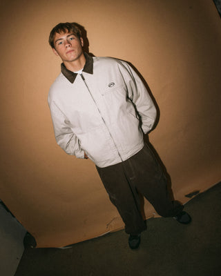 Man wearing Wookie Workwear Jacket in Abbey Stone