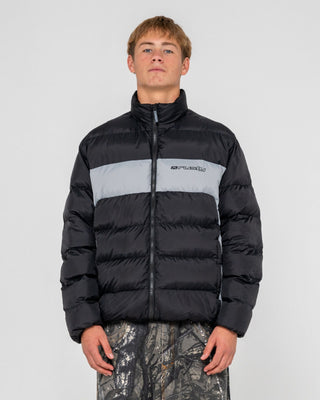 Man wearing Pit Viper Puffer Jacket in Black