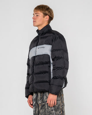 Man wearing Pit Viper Puffer Jacket in Black