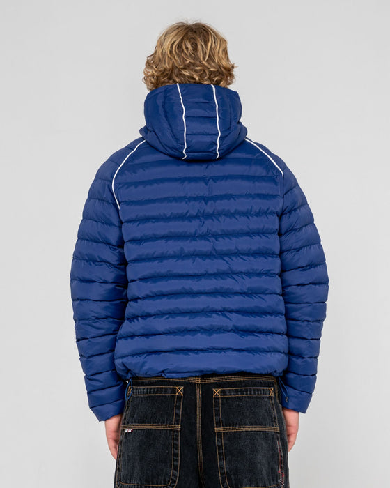man-wearing-pipe-line-puffer-jacket-in-navy-blue