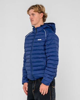 Man wearing Pipe Line Puffer Jacket in Navy Blue