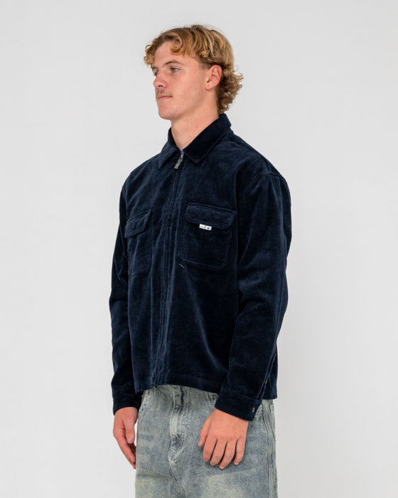 man-wearing-zeal-cord-zip-thru-over-shirt-in-navy-blue