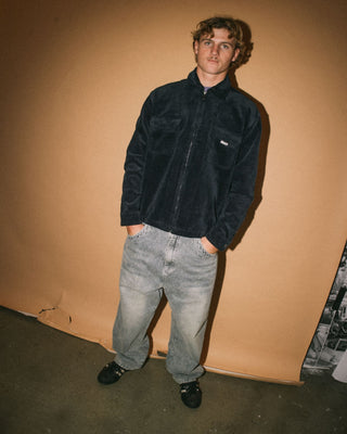 Man wearing Zeal Cord Zip Thru Over Shirt in Navy Blue