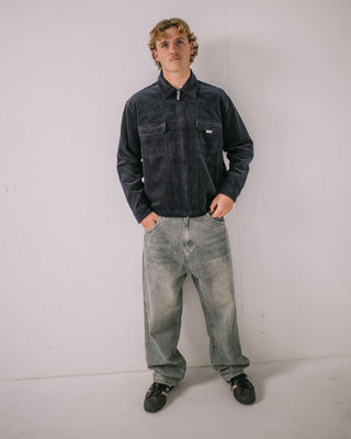Man wearing Zeal Cord Zip Thru Over Shirt in Navy Blue