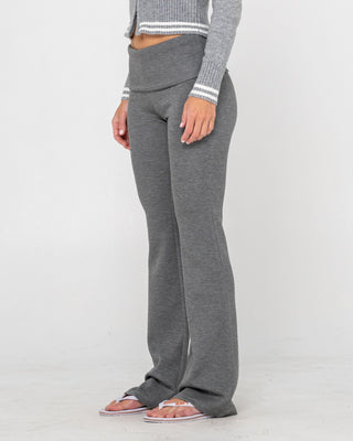 Woman wearing Hilton Low Rise Bootleg Track Pant in Charcoal Marle