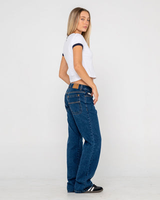 Woman wearing Suzy Straight Low Rise Jean in Deep Sea Blue