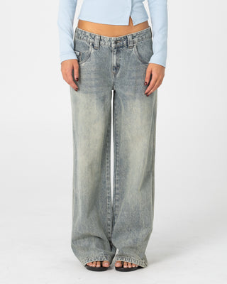 Woman wearing Lucy Loose Low Rise Jean in Dirty Dawg