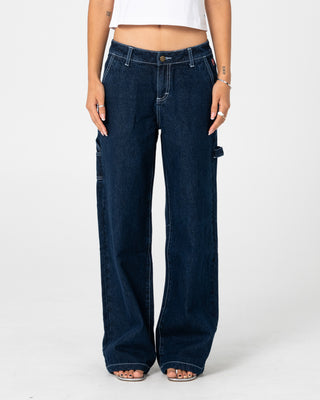 Woman wearing Billie 2.0 Low Rise Carpenter Jean in Indigo