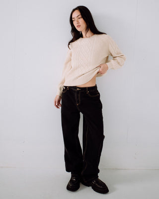 Woman wearing Bethany Baggy Low Rise Jean in Black Out