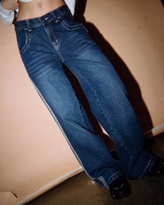 Woman wearing Flip Mommy DIY Low Rise Denim Jean in Blasted Deep Sea Blue