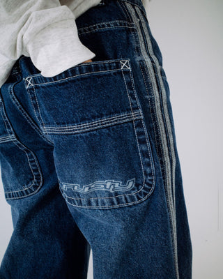 Woman wearing Flip Mommy DIY Low Rise Denim Jean in Blasted Deep Sea Blue