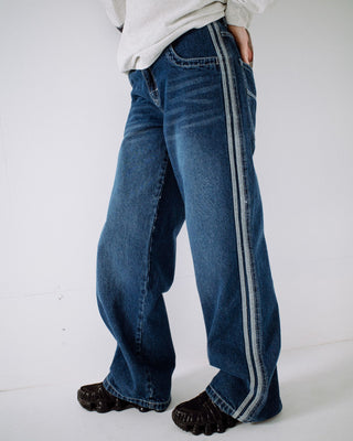 Woman wearing Flip Mommy DIY Low Rise Denim Jean in Blasted Deep Sea Blue